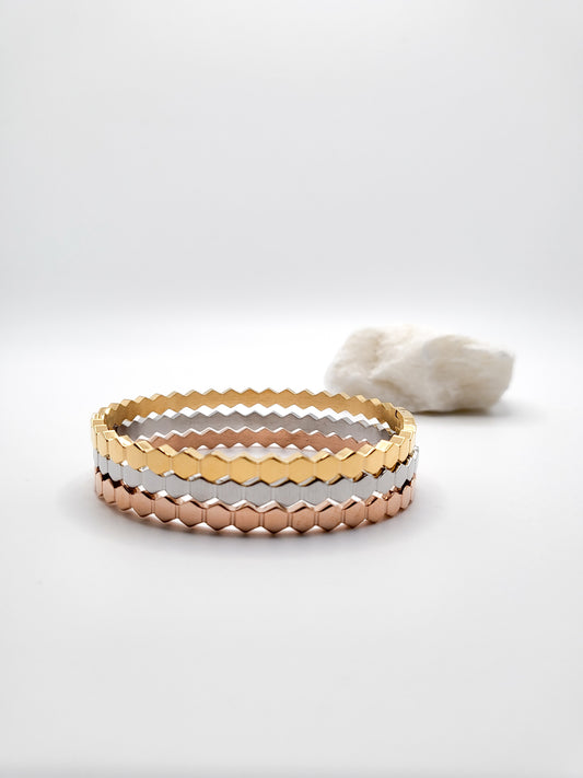 Rose gold, gold and silver color bracelets stacked