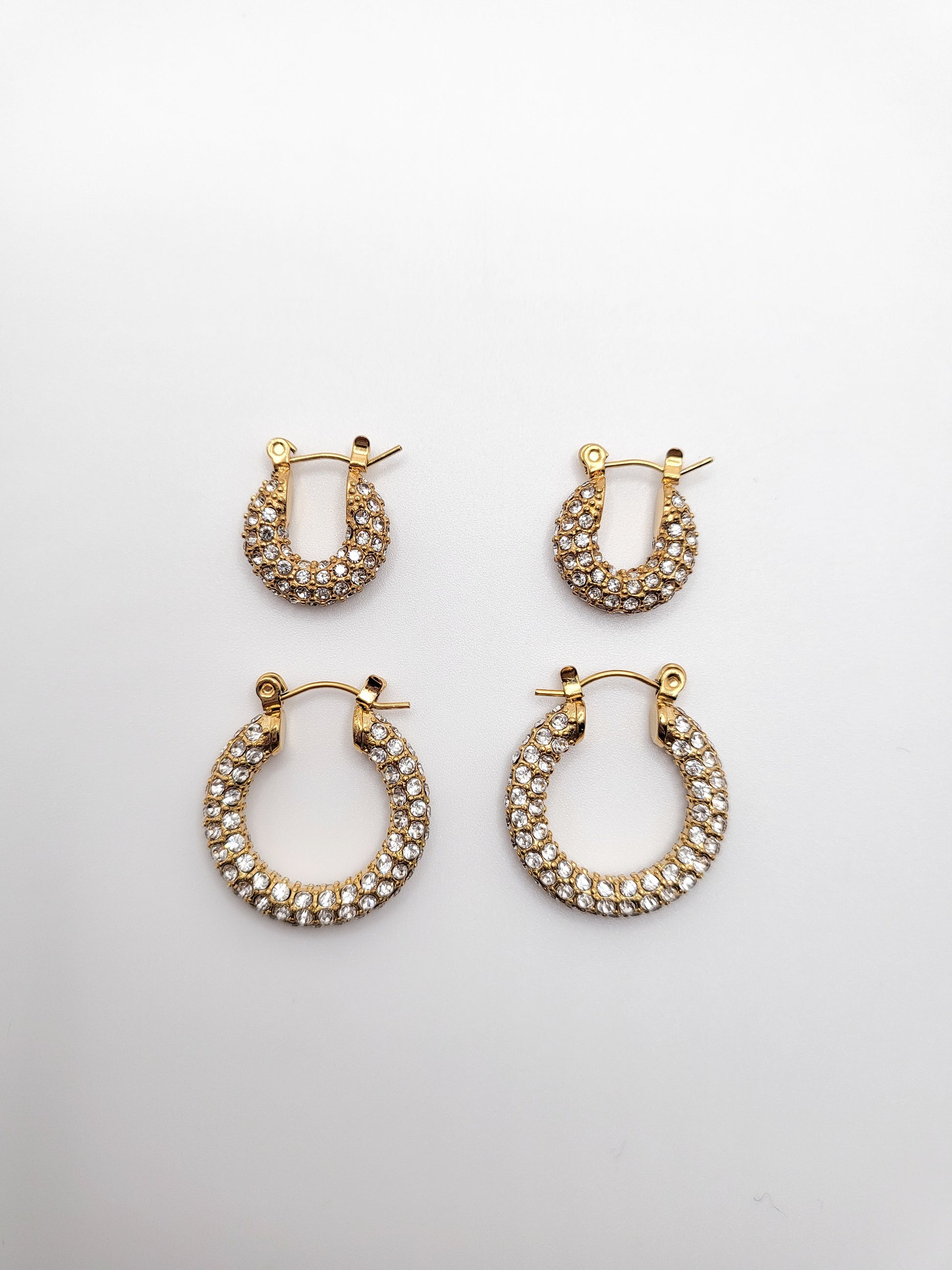 Gold plated earrings with zircons in small and medium