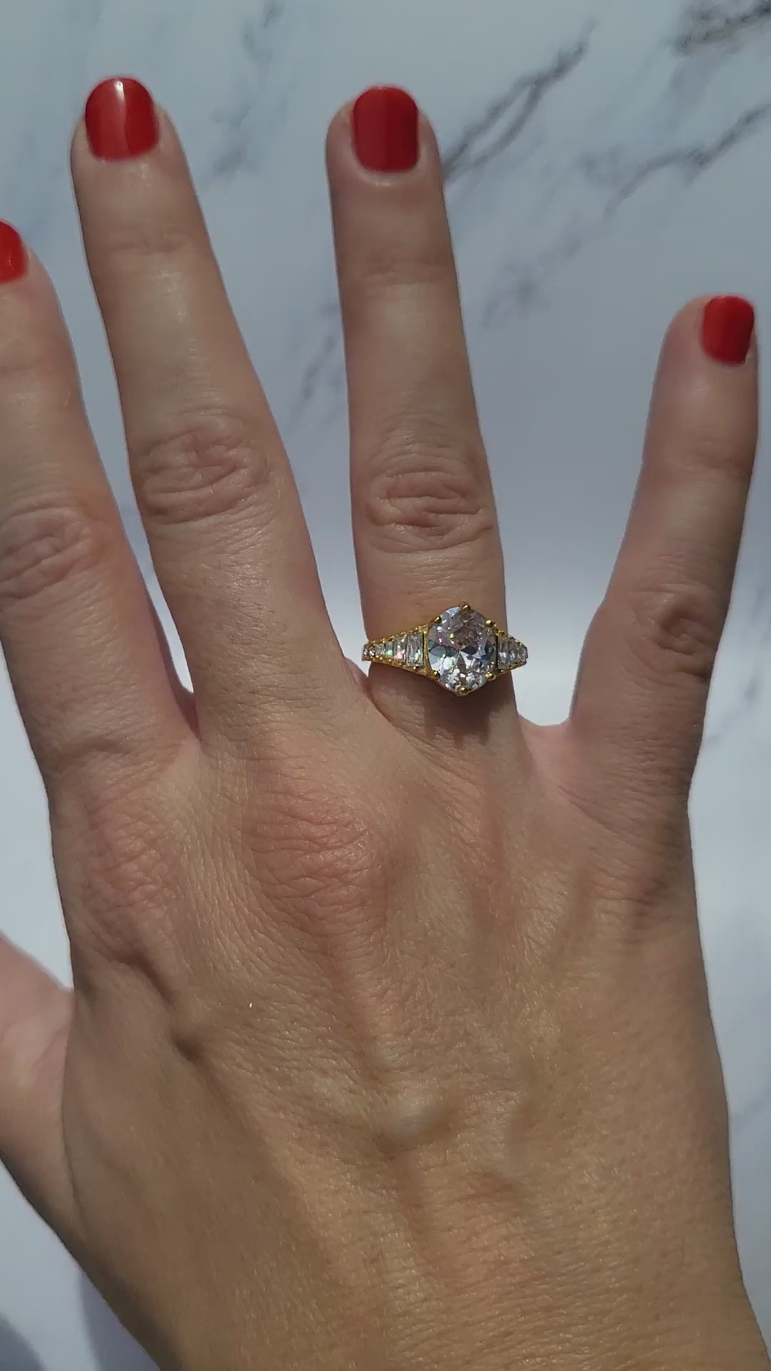 Video of gold plated ring with big zircons